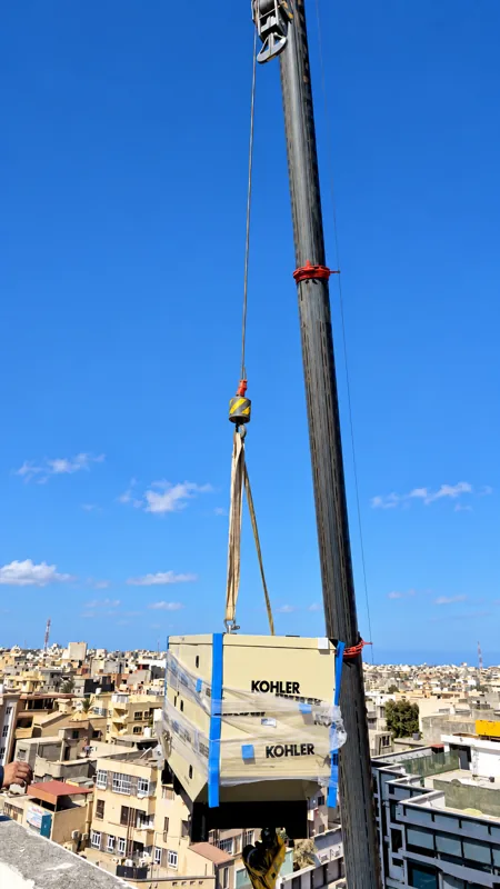 Lifting the generator to the rooftop